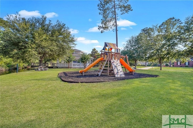 view of play area with a yard