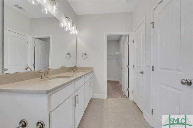 bathroom featuring vanity and tile patterned floors