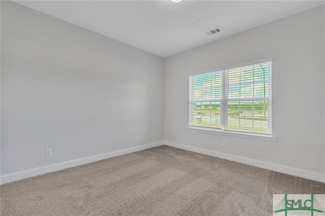 view of carpeted spare room