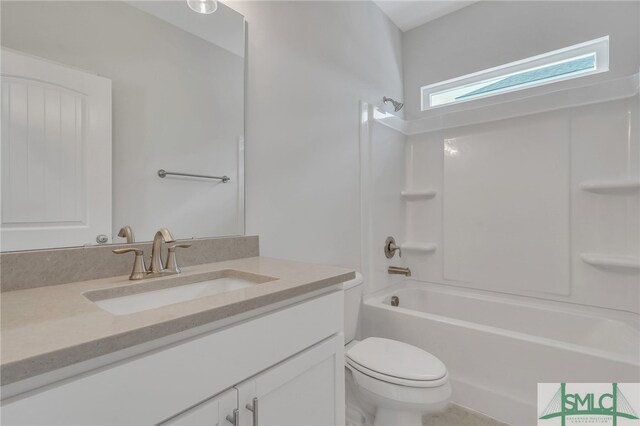 full bathroom with vanity, shower / washtub combination, and toilet