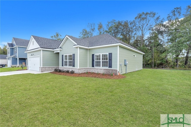 view of front of property with a garage and a front lawn