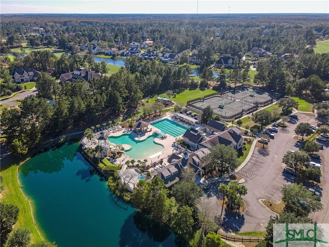 bird's eye view with a water view