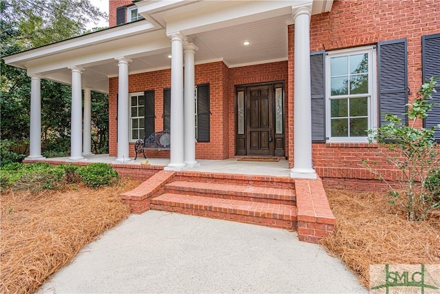 entrance to property with covered porch