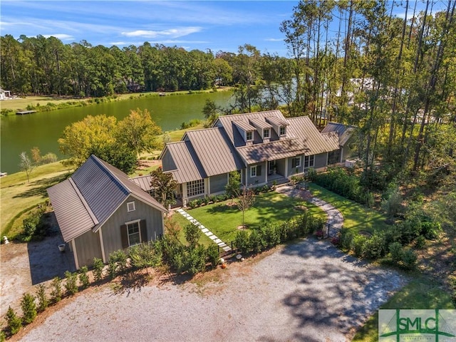 birds eye view of property featuring a water view