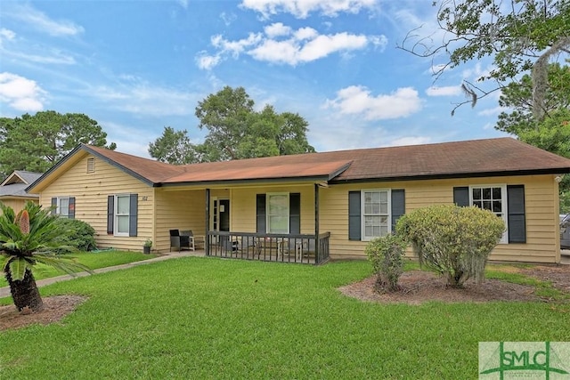 ranch-style house featuring a front lawn and a porch