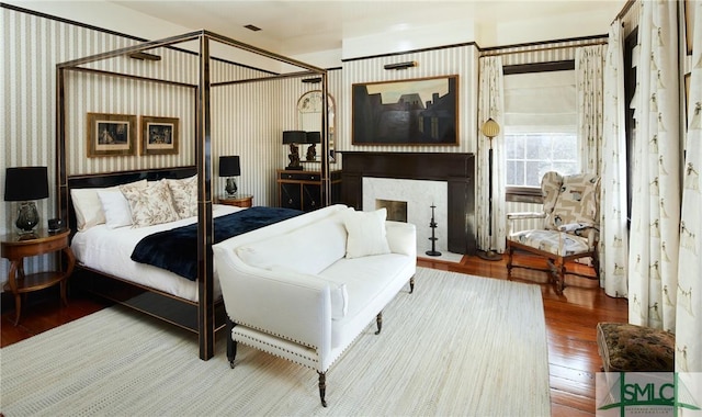 bedroom featuring wood-type flooring