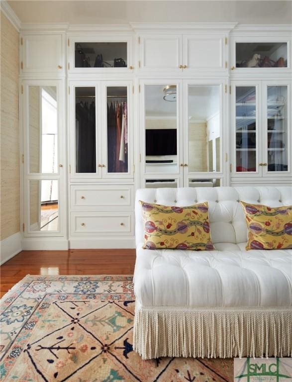 unfurnished bedroom featuring light wood-type flooring and a closet