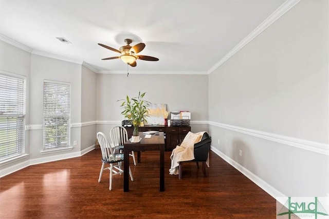 dining area featuring a wealth of natural light, crown molding, and dark hardwood / wood-style floors