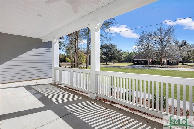 view of patio featuring ceiling fan and covered porch