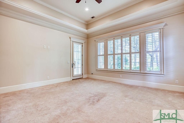 unfurnished room with ornamental molding, carpet, and a healthy amount of sunlight