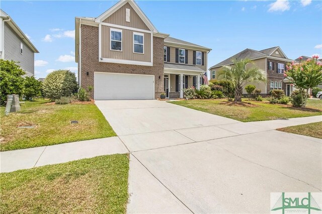 view of front of property with a garage and a front lawn