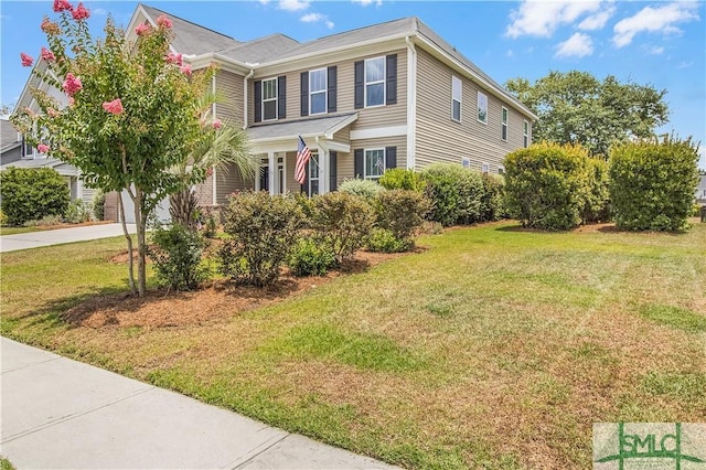 view of front of home featuring a front yard