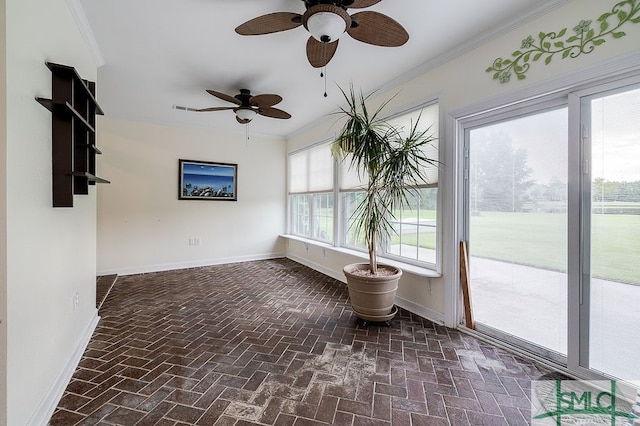 interior space with ceiling fan