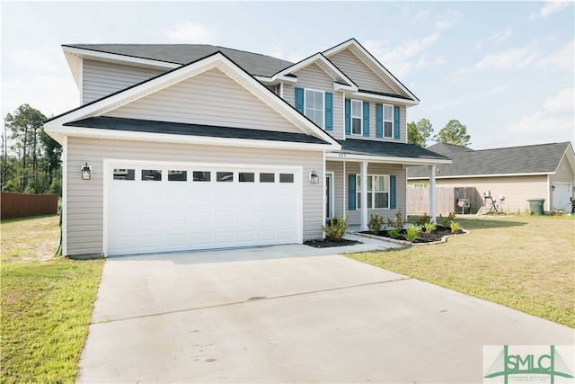 view of front of property with a porch, a garage, and a front yard