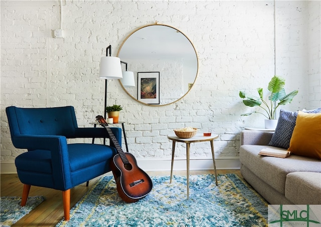 living area with wood-type flooring