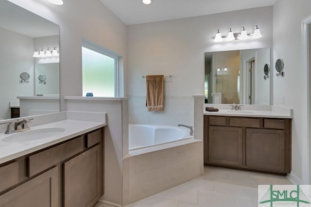 bathroom featuring tile patterned flooring, vanity, and plus walk in shower