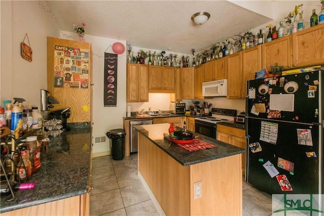 kitchen with range with electric cooktop, a textured ceiling, black fridge, stainless steel dishwasher, and kitchen peninsula