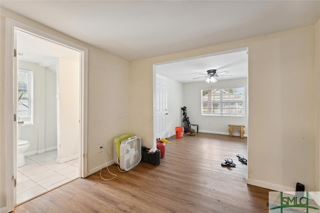 miscellaneous room with light wood-type flooring and ceiling fan