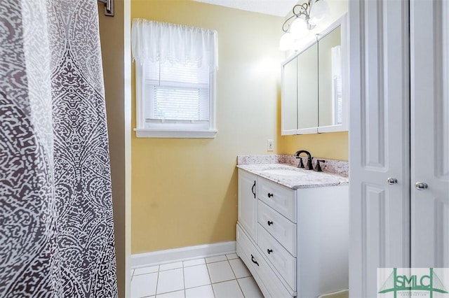 bathroom with vanity and tile patterned floors