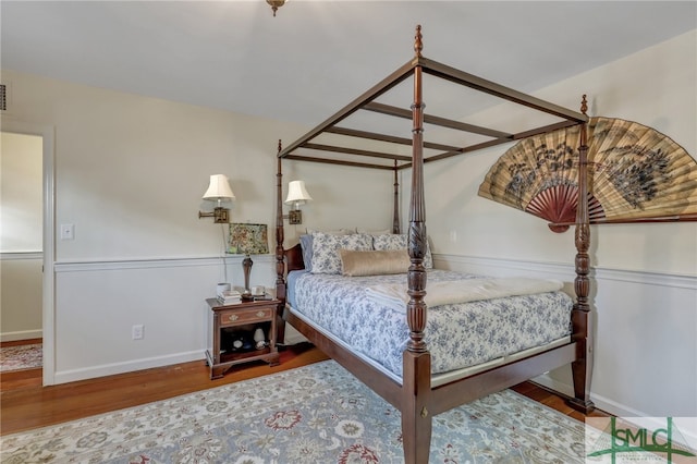 bedroom featuring hardwood / wood-style floors