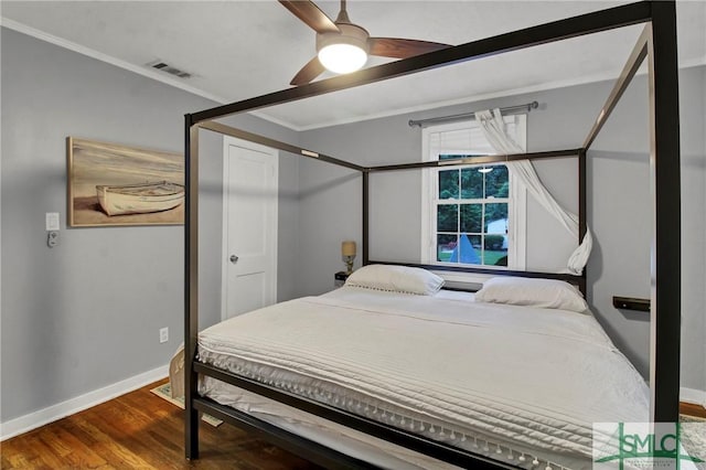 bedroom with ceiling fan, ornamental molding, and hardwood / wood-style flooring