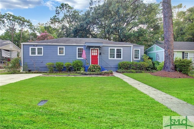 ranch-style home with a front lawn