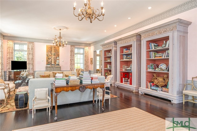 dining space featuring a chandelier, a wealth of natural light, dark hardwood / wood-style floors, and ornamental molding