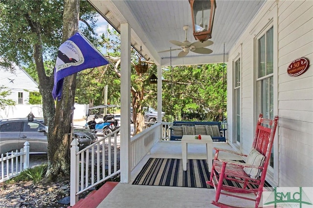 view of patio / terrace with a porch and ceiling fan