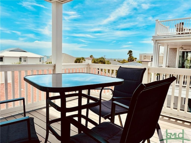 wooden deck with outdoor dining area