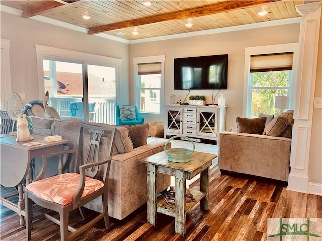 living area with beamed ceiling, ornamental molding, wood-type flooring, and wood ceiling