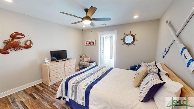 bedroom with recessed lighting, wood finished floors, ceiling fan, baseboards, and visible vents