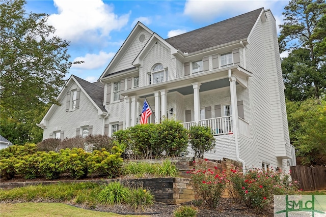 view of front of property featuring covered porch