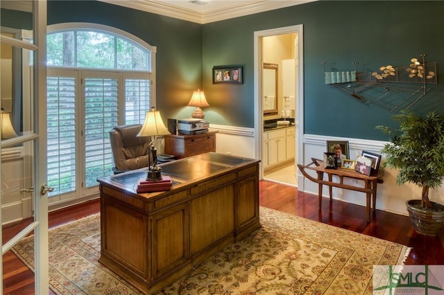 home office with crown molding, wainscoting, plenty of natural light, and wood finished floors