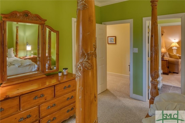 hall featuring carpet and baseboards