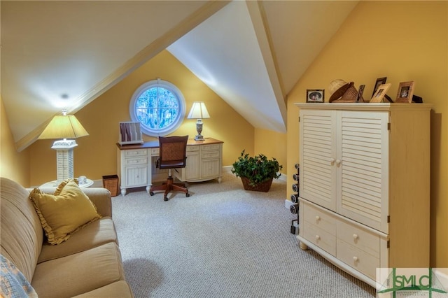 carpeted office space with vaulted ceiling