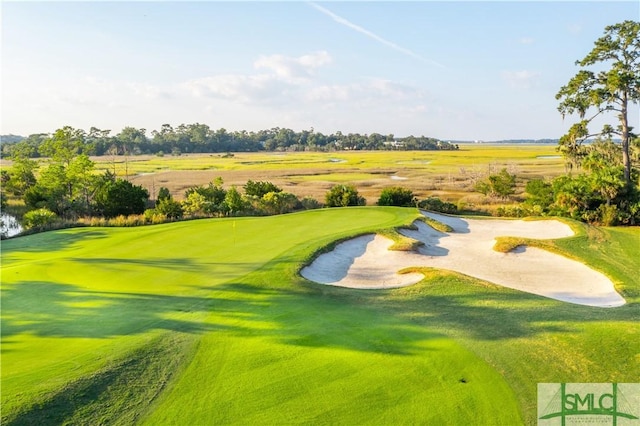 view of home's community featuring view of golf course