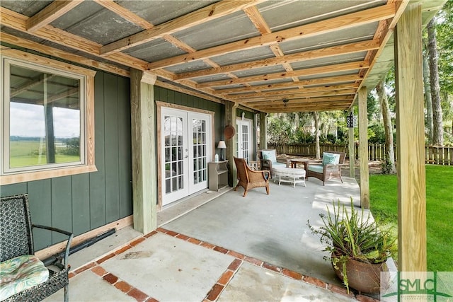 view of patio featuring french doors and an outdoor living space