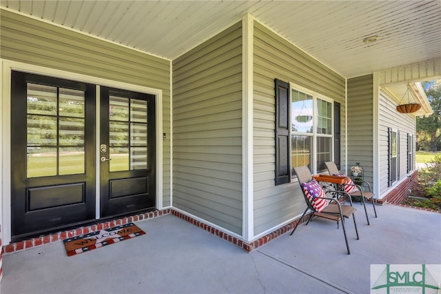 doorway to property featuring a porch