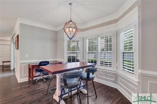 dining space featuring an inviting chandelier, dark hardwood / wood-style flooring, and ornamental molding