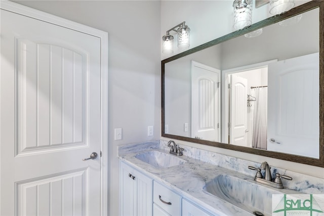 bathroom with dual bowl vanity