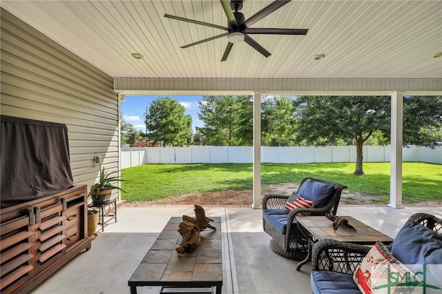 view of patio featuring ceiling fan