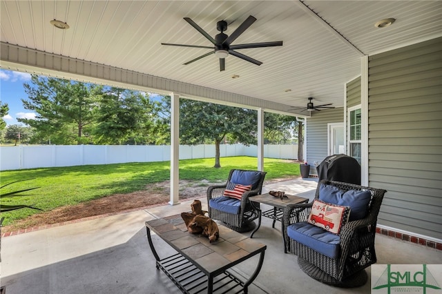 view of patio featuring ceiling fan