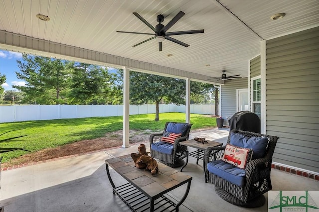 view of patio / terrace featuring ceiling fan