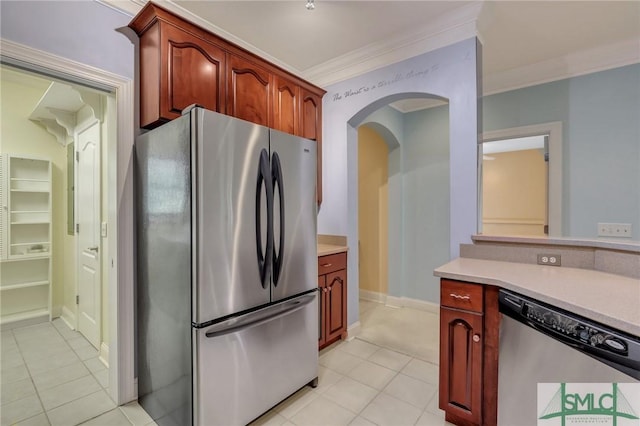 kitchen featuring stainless steel appliances, crown molding, and light tile patterned flooring