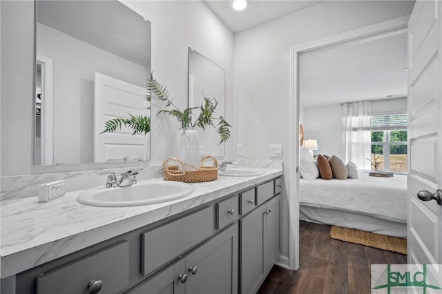 bathroom featuring vanity and hardwood / wood-style floors