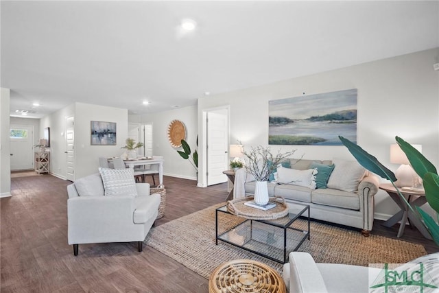 living room featuring dark hardwood / wood-style flooring