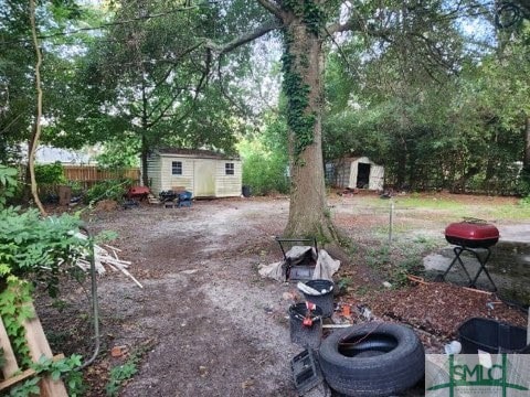 view of yard with a storage shed