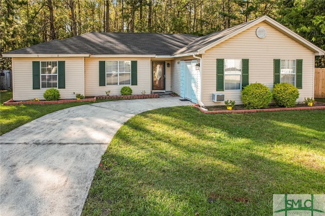 ranch-style house featuring a front lawn