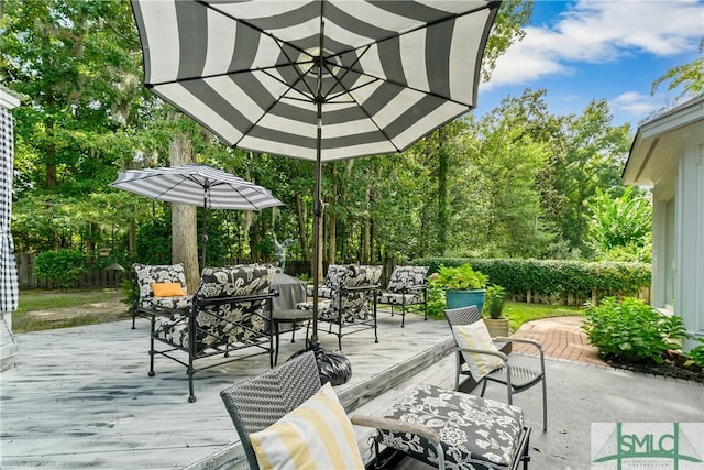 view of patio / terrace featuring a wooden deck