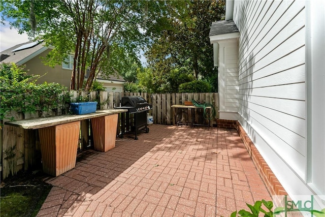 view of patio / terrace featuring exterior bar and area for grilling